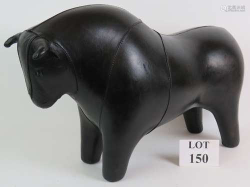 A black leather bull footstool in the style of Dimitri Omers...