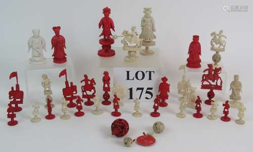 An antique Chinese carved Ivory and bone harlequin chess set...