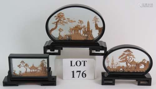 Three Chinese cork carved Pagoda scenes in glazed laquered f...