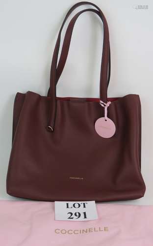 A top quality Coccinelle grained leather tote bag with origi...