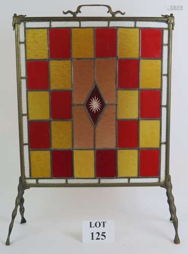 A turn of the century Arts and Crafts inspired stained glass...