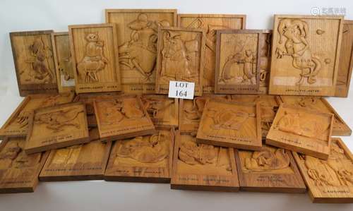 A unique collection of 26 hand carved oak animal alphabet pl...