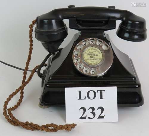 A black GPO Bakelite telephone c1930s with modern BT socket ...