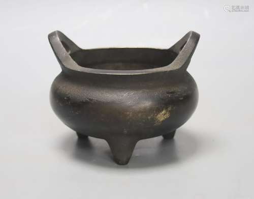 A Chinese bronze tripod censer, Xuande four character mark h...