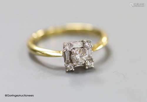 A modern 18ct gold, round and baguette cut diamond set squar...