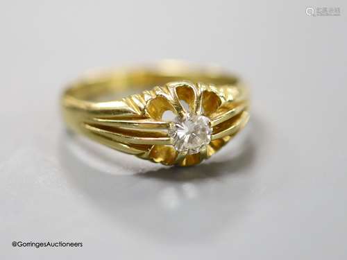 A modern 18ct gold and claw set solitaire diamond ring, size...