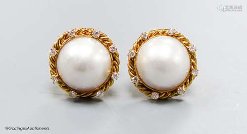 A modern pair of yellow metal (stamped 14k), mabe pearl set ...