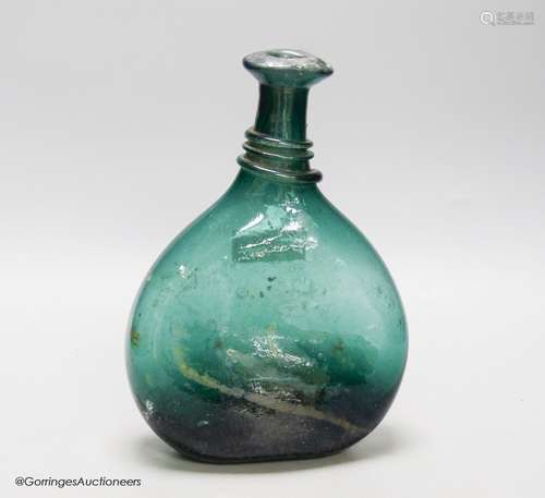 An 18th/19th century Persian green glass flask, Qajar dynast...