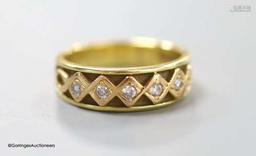 An 18ct gold five-stone diamond ring,the old cut diamonds in...