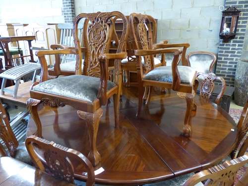 A set of twelve Chippendale style mahogany dining chairs, fo...