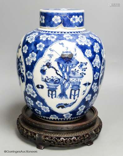 A Chinese blue and white 'Hundred Antiques' jar, Kangxi mark...