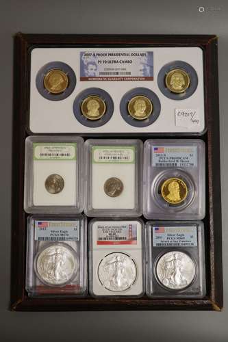 A group of US proof or uncirculated coins in capsules -Four ...