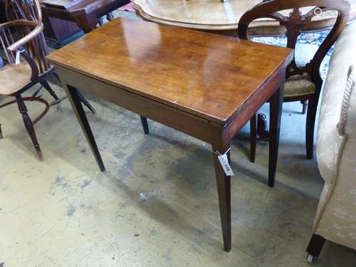 A George III rectangular mahogany folding card table, height...