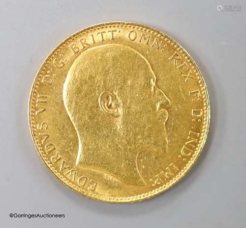 An Edward VII 1908 gold sovereign.