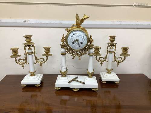 A French white marble and ormolu clock garniture, c.1900, no...