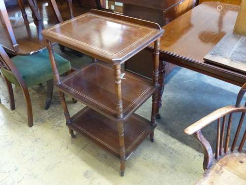 A late Victorian mahogany three tier whatnot, width 58cm, de...