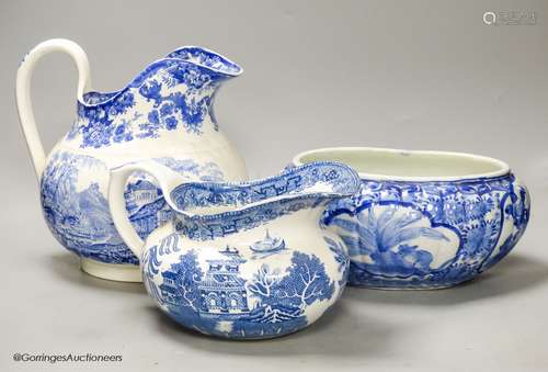 A Mintons blue and white jug, another and a Japanese blue an...