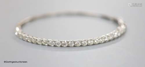 A modern 18ct white gold and twenty three stone diamond set ...