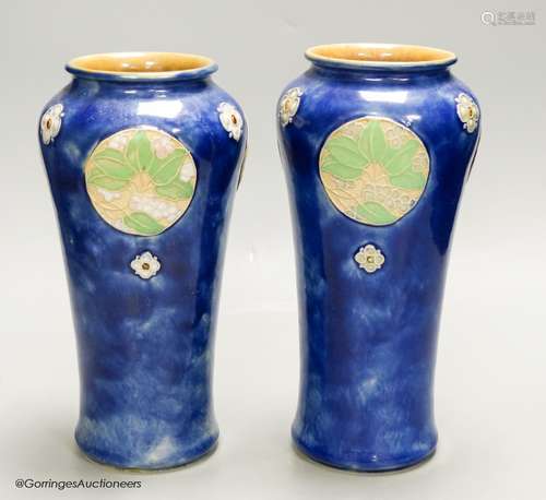 A pair of Royal Doulton blue glazed vases, height 24.5cm