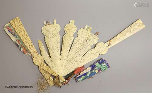 A 19th century Canton ivory and painted paper fan, in need o...