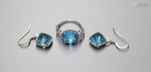 A modern 18ct white gold, blue topaz and diamond chip set dr...