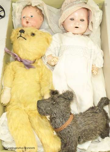 A 1939 Canadian reliable 'Netums' composition doll and a sim...