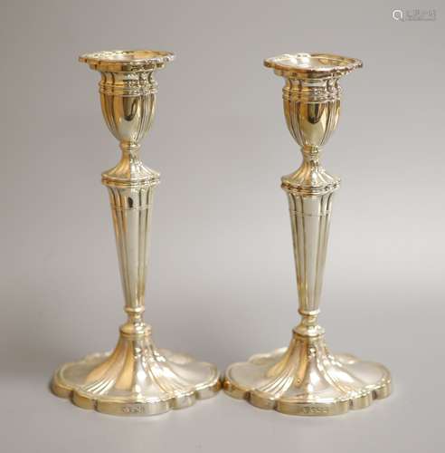 A pair of modern silver shaped oval candlesticks, C.J. Vande...