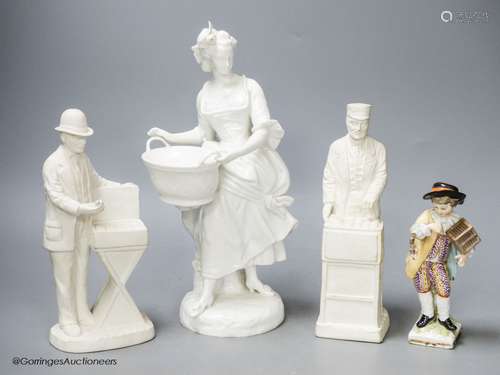 A French white glazed figure, a pair of biscuit porcelain fi...