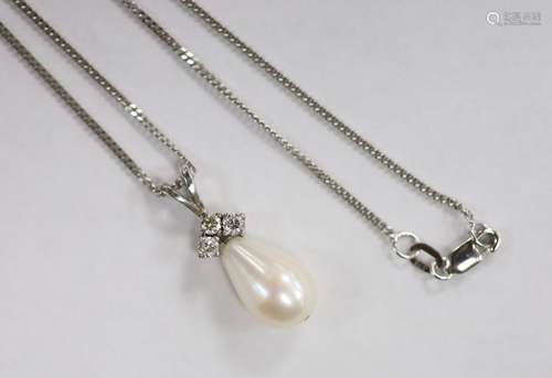 A modern 18ct white gold, cultured pearls and three stone di...