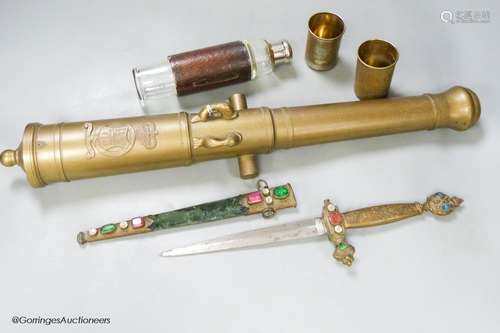 A bronze model cannon barrel, a dagger and a leather cased '...