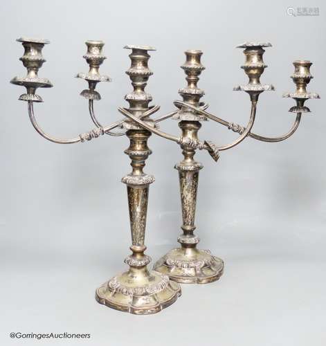 A pair of silver plated two branch three light candelabra, h...