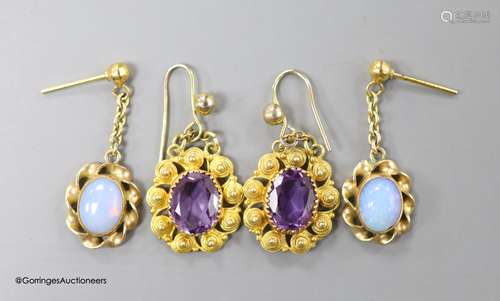 A pair of late Victorian yellow metal and amethyst set oval ...