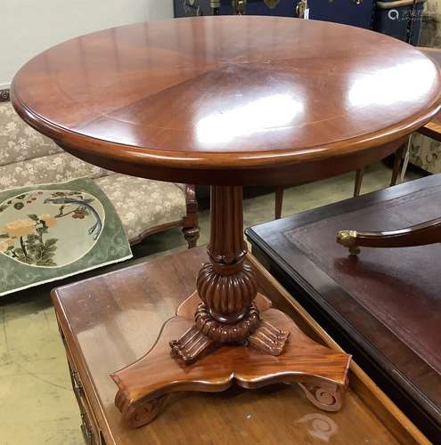 A William IV style mahogany tilt-top centre tableraised on s...