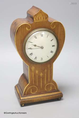 A French Art Nouveau mahogany and marquetry mantel timepiece...