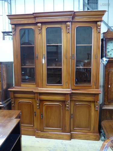 A Victorian style mahogany breakfront library bookcase, leng...