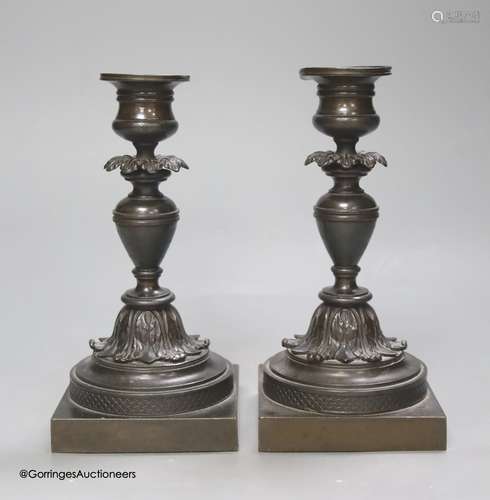 A pair of 19th century French bronze dwarf candlesticks, hei...