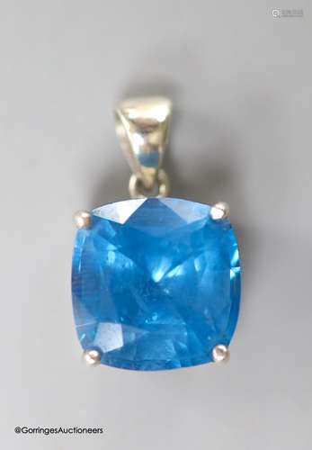 A white metal mounted square cushion cut blue topaz pendant,...