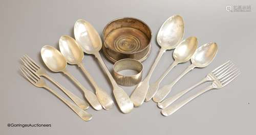 Four George III silver forks, six spoons, a later bottle coa...