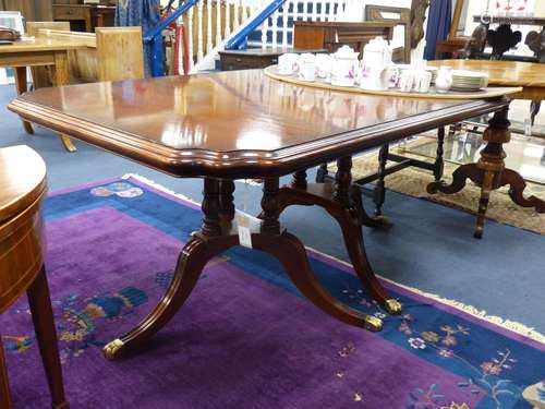 A Harrod's Regency style twin tri-pillar mahogany extending ...