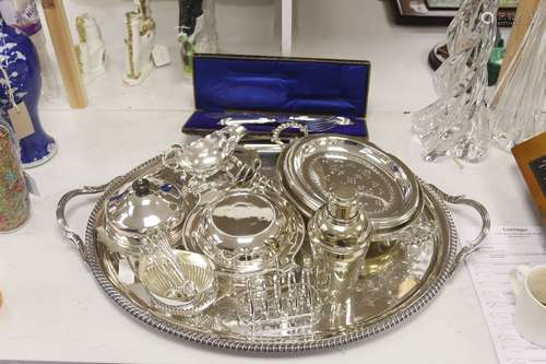 A collection of silver-plated wares to include an oval drink...