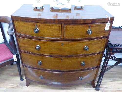 An early 19th century bow fronted mahogany chest, width 91cm...