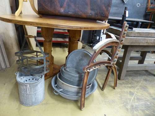 A pair of cast iron bench ends and assorted galvanised metal...