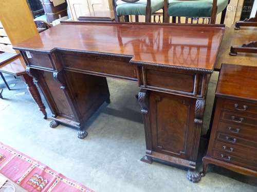 A Victorian mahogany inverse breakfront pedestal sideboard, ...