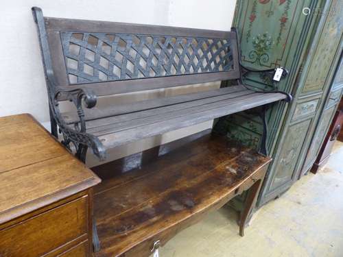 A painted cast metal garden bench, length 126cm, depth 52cm,...