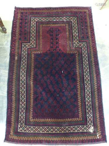 A Belouch red ground prayer rug, 146 x 90cm