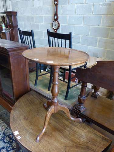 A George III circular mahogany tilt top tripod table, diamet...