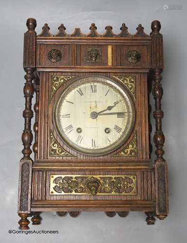 A late 19th century oak mantel clock, retailed by Crambrook ...