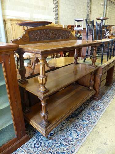 A late Victorian oak three tier buffet, length 136cm, depth ...