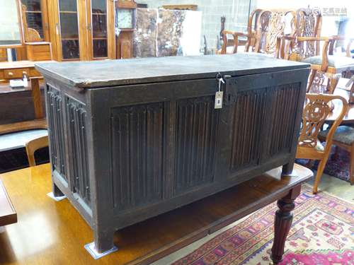 A carved and panelled oak chest, length 129cm, depth 51cm, h...