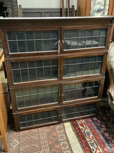 A Globe Wernicke style mahogany four section bookcase, no ba...